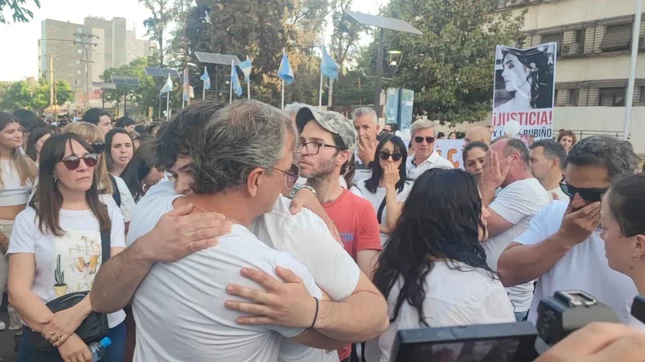 padre y hermano de Lucía Rubiño