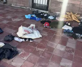 Rompió la vidriera de un local en Rawson, robó prendas y fue detenido con parte de la ropa puesta